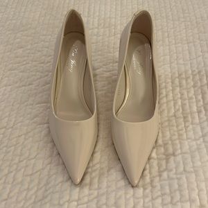 Beige closed toed heels